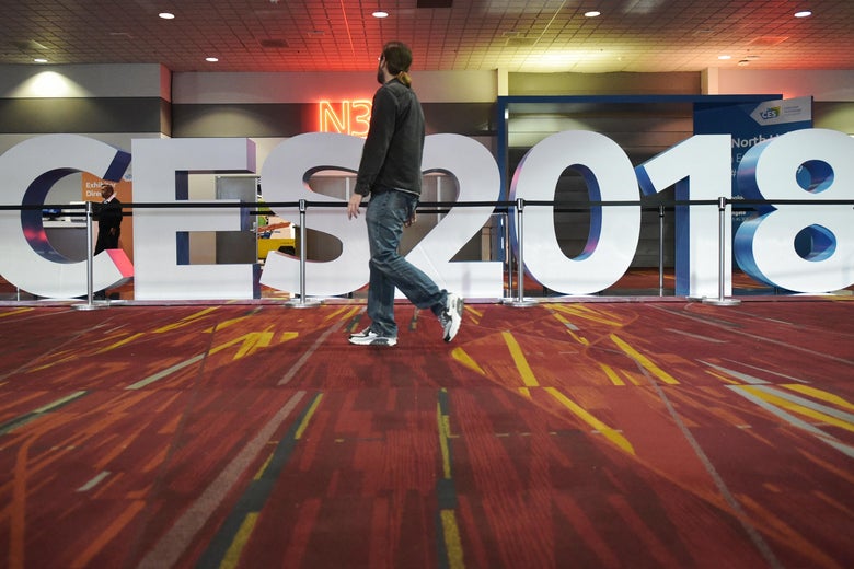 A man walks past a sign for the 2018 Consumer Electronics Show at the Las Vegas Convention Center in Las Vegas on January 6, 2017. The 2018 CES runs from January 9-12. / AFP PHOTO / MANDEL NGAN        (Photo credit should read MANDEL NGAN/AFP/Getty Images)