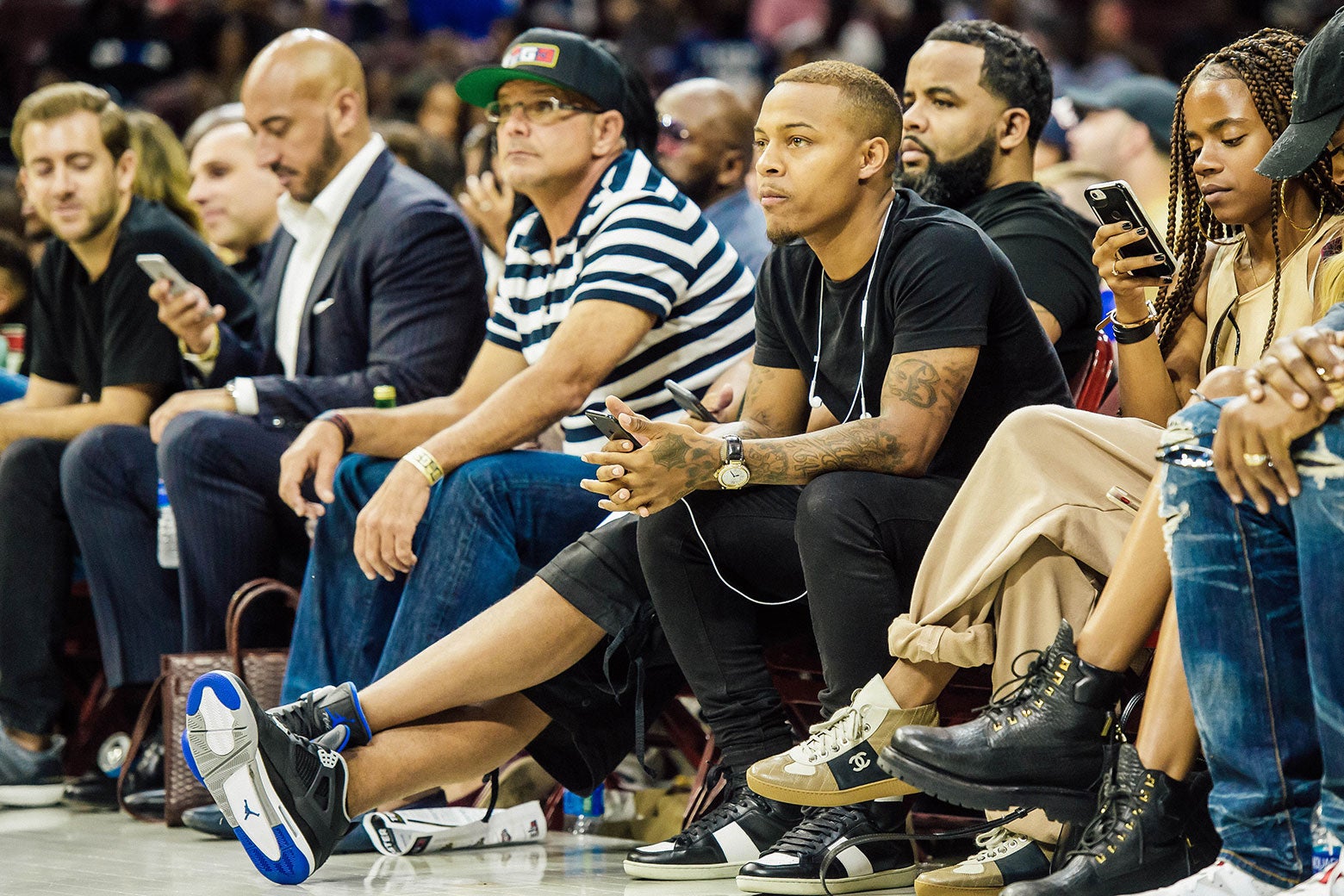 Actor / rapper Bow Wow looks on during a BIG3 game on July 16, 2017 at Wells Fargo Center in Philadelphia, PA. Also pictured is Ahmed Al-Rumaihi.