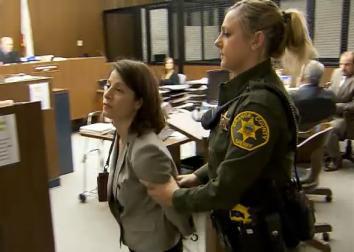 Patricia Esparza with an Orange County, Calif., police officer after rejecting a plea deal on Nov. 22, 2013.