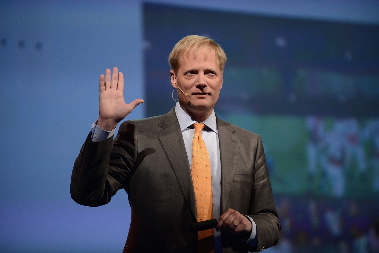 Brian Wansink raises a hand during the 2013 Discovery Vitality Summit in Johannesburg, South Africa.