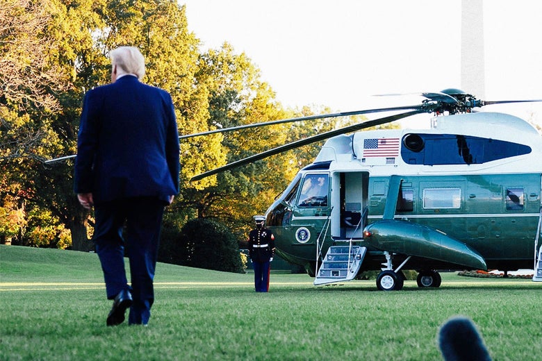 Trump, back to camera, walking toward Marine 1