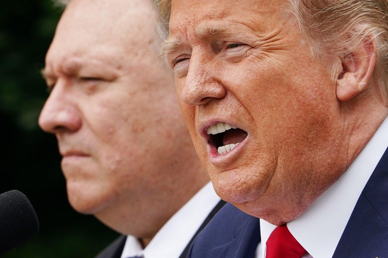 President Donald Trump, with Secretary of State Mike Pompeo, holds a press conference on China on May 29, 2020, in the Rose Garden of the White House in Washington, D.C.
