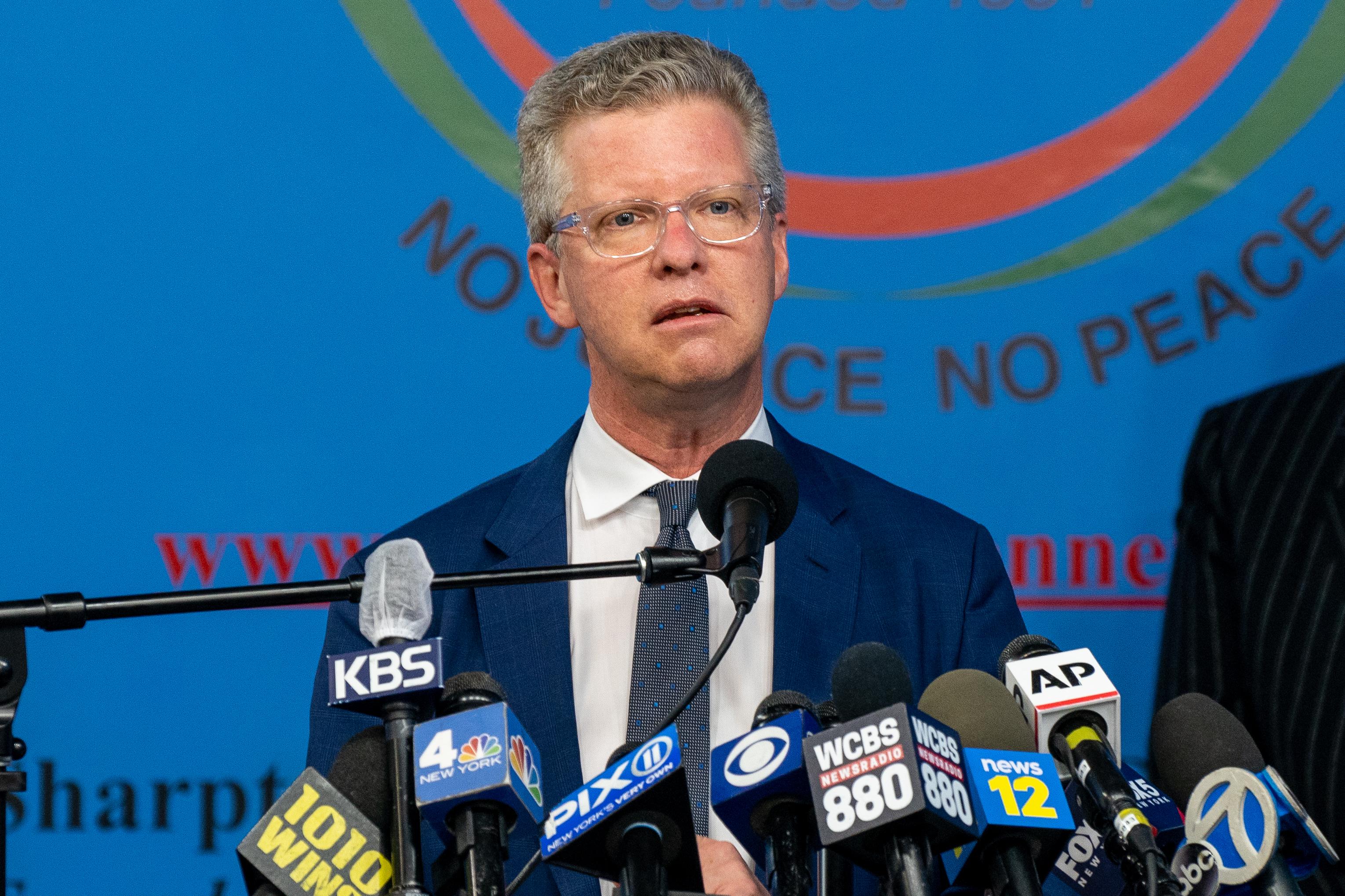 Shaun Donovan speaks at a mic during a press conference in New York City on March 18