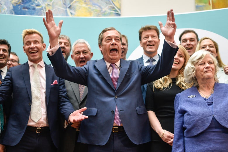 Brexit Party leader Nigel Farage speaks to the media as he stands with newly elected Brexit Party MEPs, including Dr David Bull (L) and Ann Widdecombe (R) at a Brexit Party event on May 27, 2019 in London, England. 