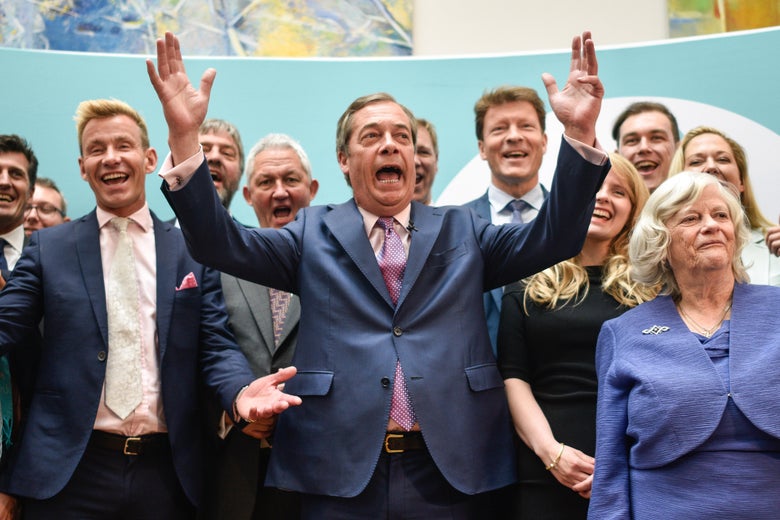 Brexit Party leader Nigel Farage speaks to the media as he stands with newly elected Brexit Party MEPs, including Dr David Bull (L) and Ann Widdecombe (R) at a Brexit Party event on May 27, 2019 in London, England.