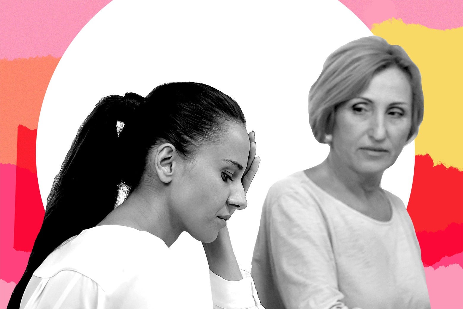 A woman puts her hand to her face as she sits next to an older woman.