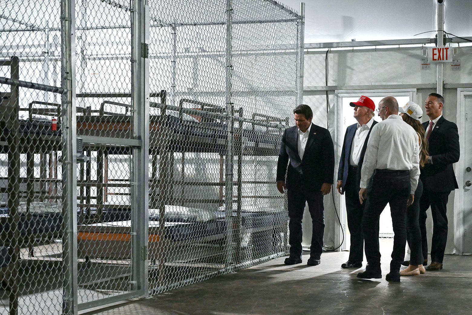 Donald Trump, Ron DeSantis and others tour Alligator Alcatraz, a concentration camp for immigrants in Florida.