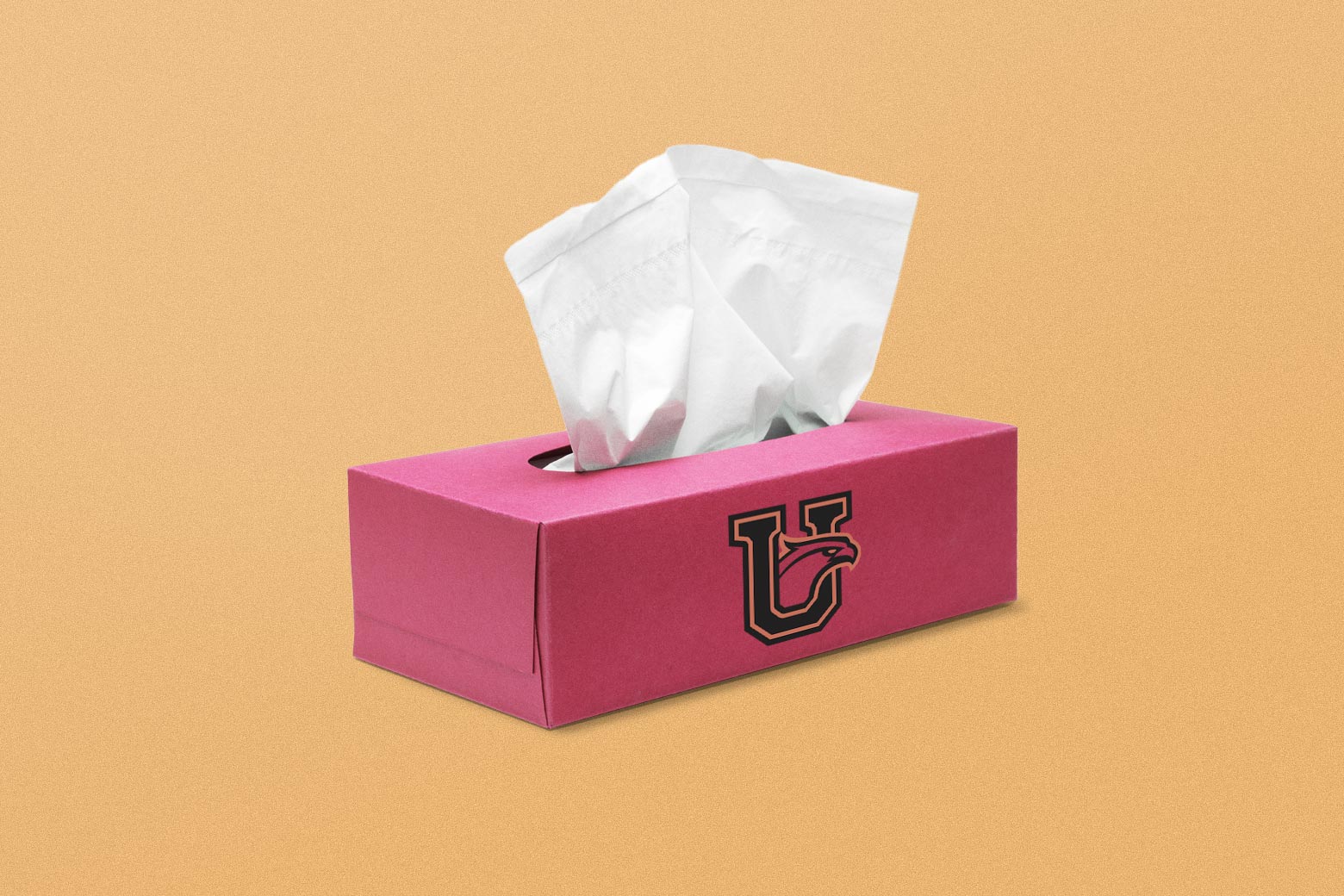 A pink Kleenex box emblazoned with a university logo over an orange background.