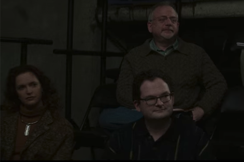 Marc Shaiman, Grace McLean, and Eli Bolin sit attentively as audience members.