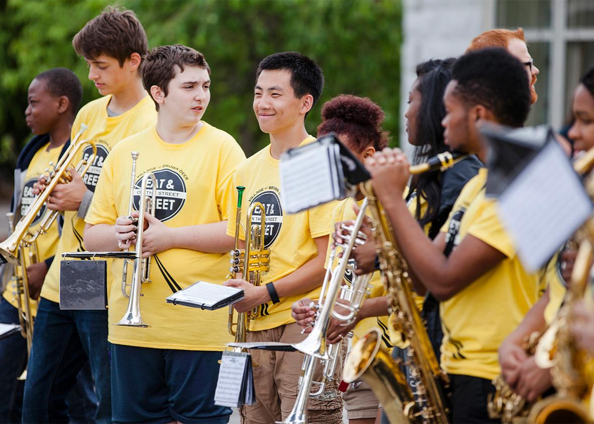 The marching band from Brown Deer High School performs at The Vi,The marching band from Brown Deer High School performs at The Village of Brown Deer "Eat & Greet on the Street" festival on Saturday June 4, 2016.