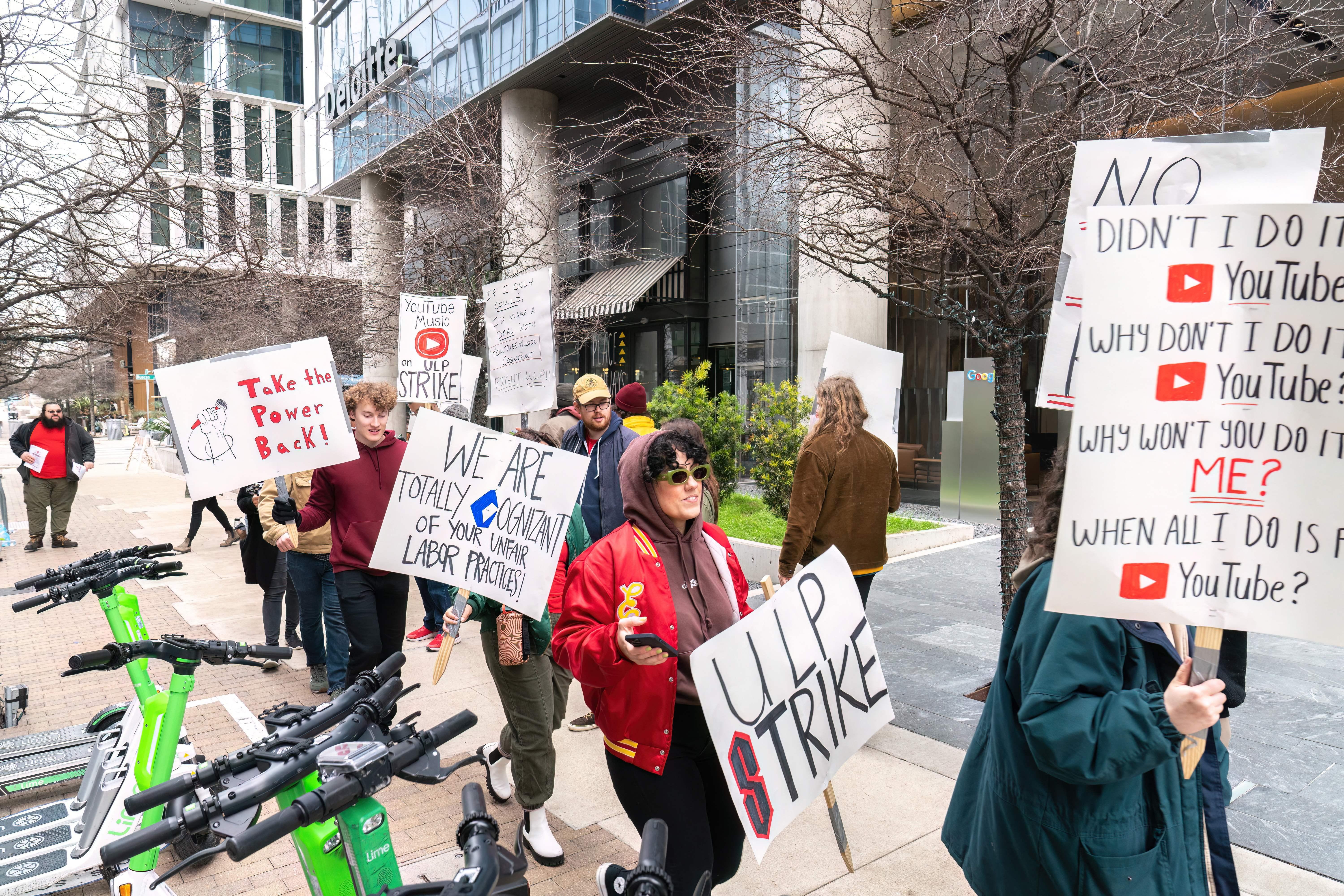 Subcontracted YouTube Music workers employed by Alphabets outsourcing partner Cognizant strike outside Google's office in Austin, Texas, on February 3, 2023. - The workers went on strike because of what they say are unfair labor practices. (Photo by SUZANNE CORDEIRO / AFP) (Photo by SUZANNE CORDEIRO/AFP via Getty Images)