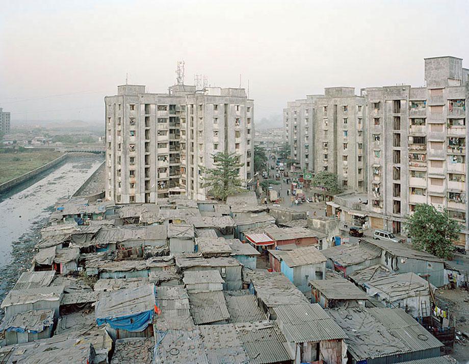 View of an informal settlement at the Lallubhai Compound in the Mankhurd section of Mumbai in December of 2011. The area, which contains many resettlement buildings where the city has relocated former residents of demolished squatter communities, is also home to it's own informal settlements.