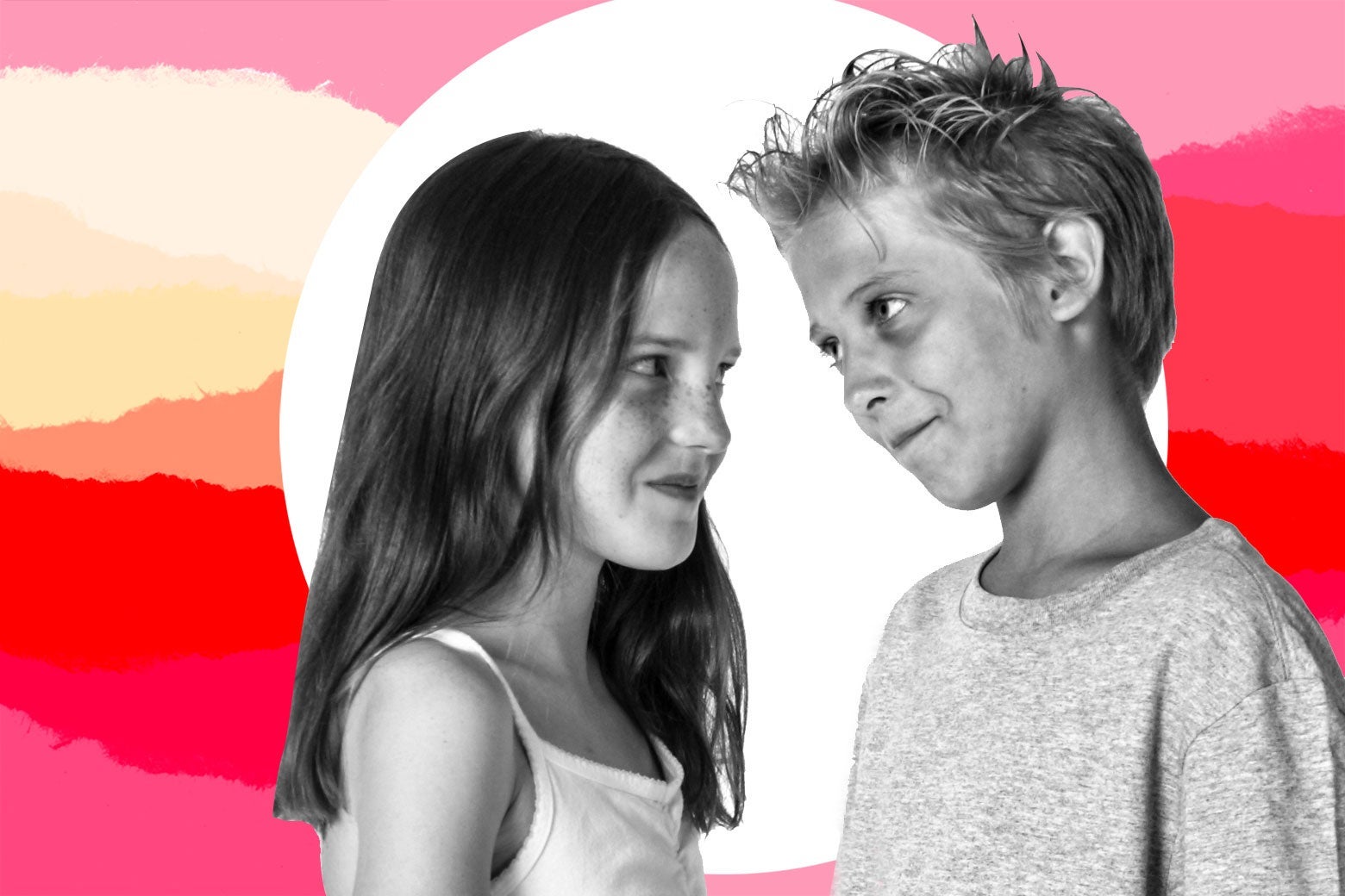 A young boy and young girl face each other.