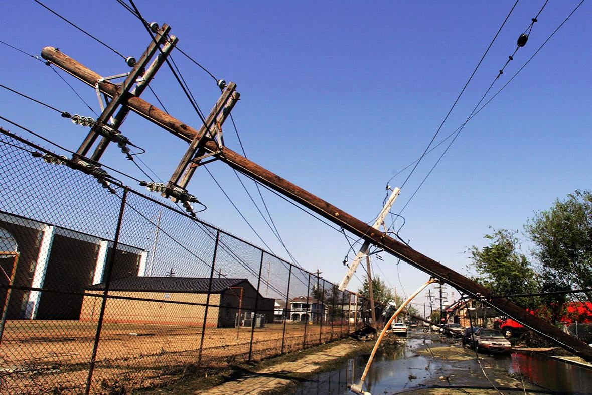 Downed telephone and power cable poles in the streets of New Orleans on Sept. 11, 2005.