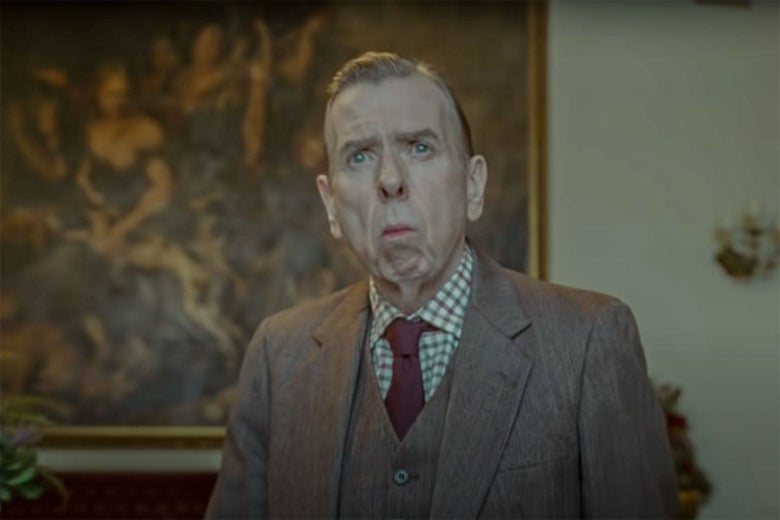 Timothy Spall in a brown tweed three-piece suit in the film.