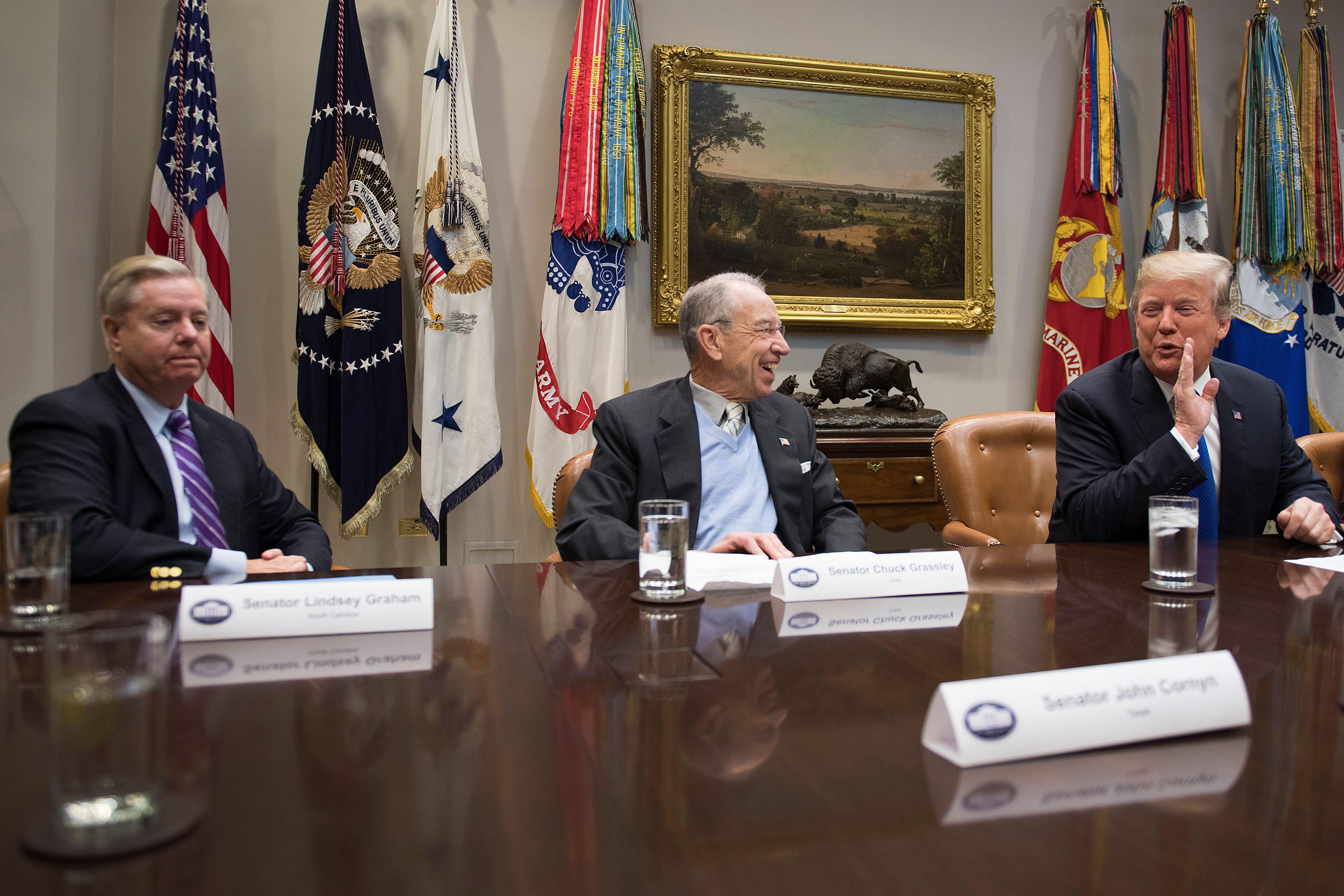 Sen. Chuck Grassley, Sen. Lindsey Graham, and Donald Trump at a meeting at the White House.