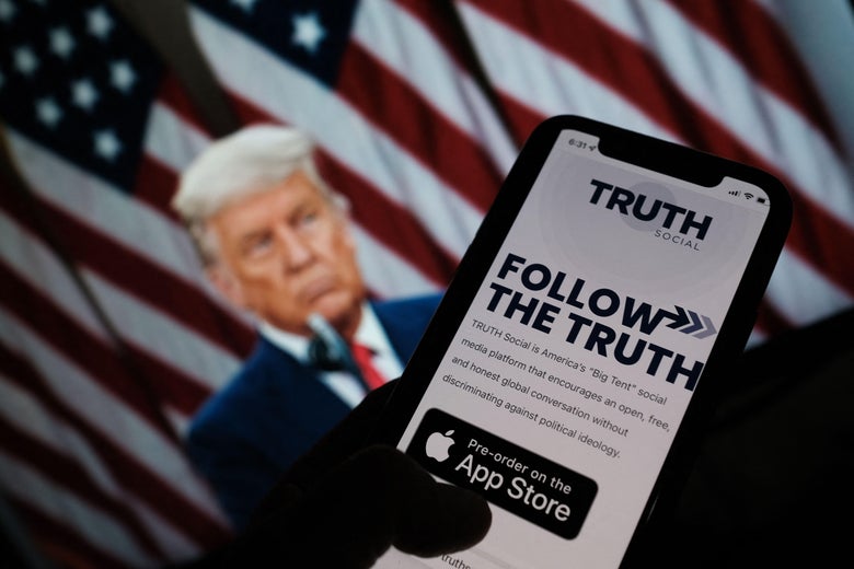This illustration photo shows a person checking the app store on a smartphone for "Truth Social."