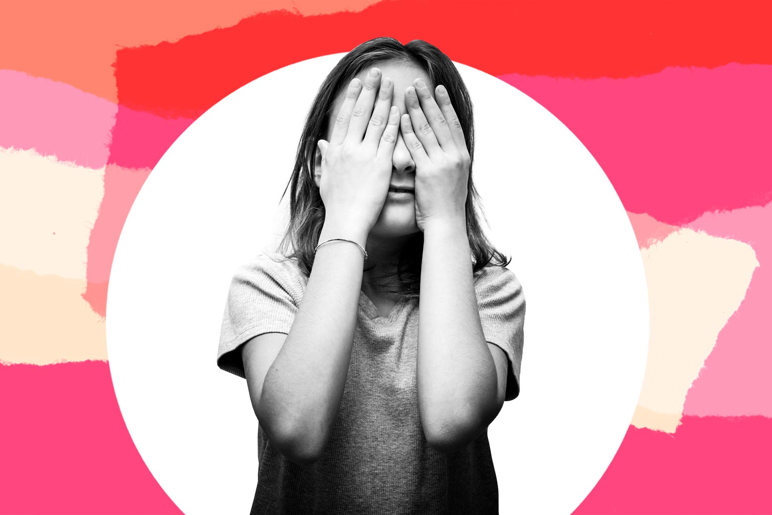 Photo illustration of a shy girl covering her face in front of abstract colorful  torn paper.