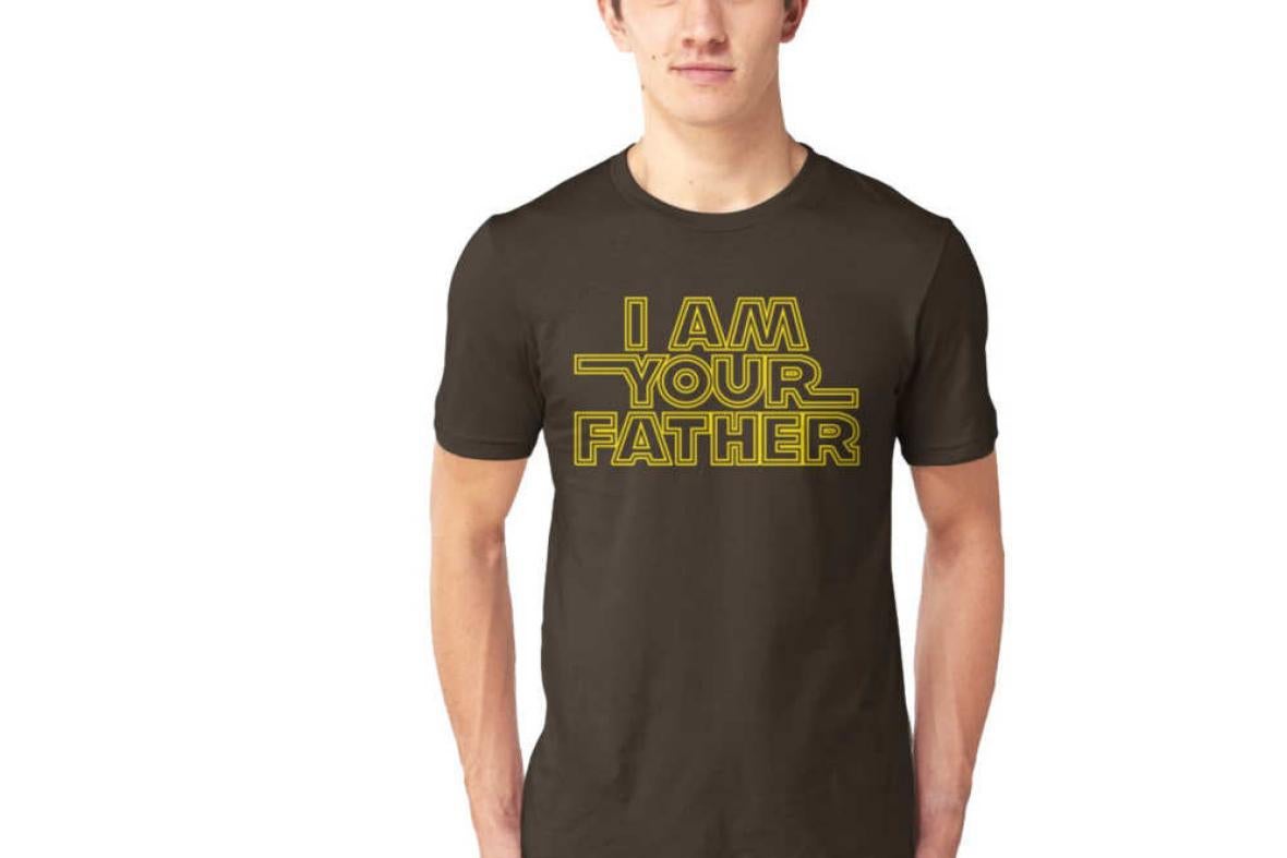 A model wearing a T-shirt that says, "I am your father."