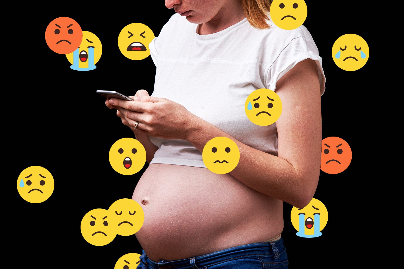 Pregnant woman in a crop T-shirt looks down at her phone and is surrounded by sad and angry emoji.