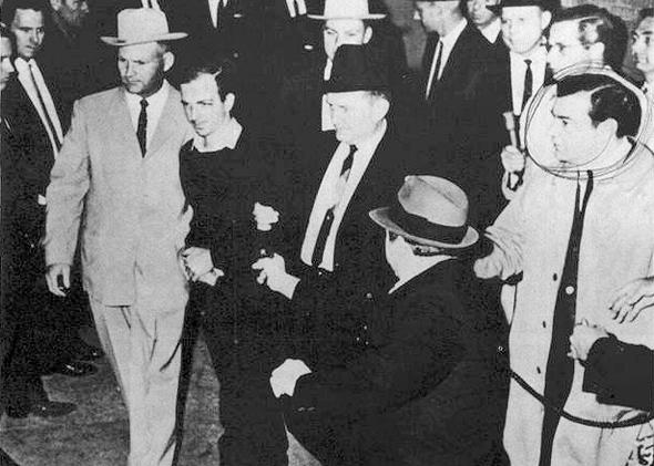 Lee Harvey Oswald being shot by Jack Ruby as Oswald is being moved by police, November 24, 1963