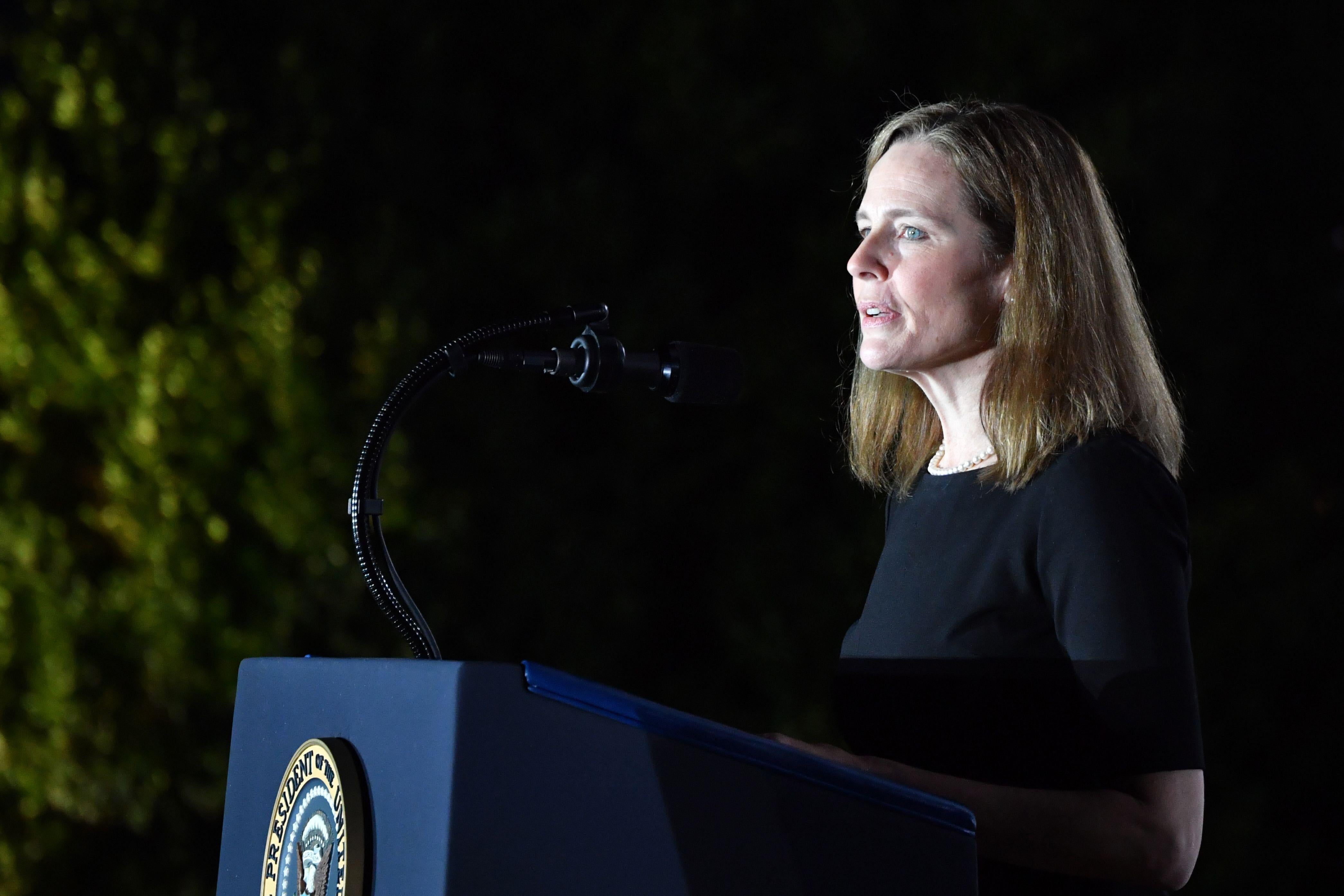 Amy Coney Barrett speaks at the White House after her confirmation to the Supreme Court.