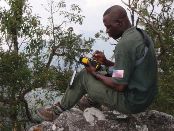 A wildlife ranger logs GPS data to be uploaded into SMART.