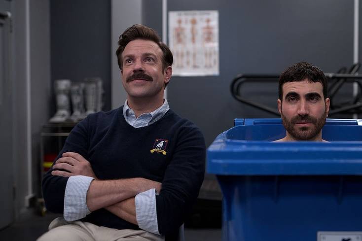 Jason Sudekis and Brett Goldstein in the physical therapy room on Ted Lasso.
