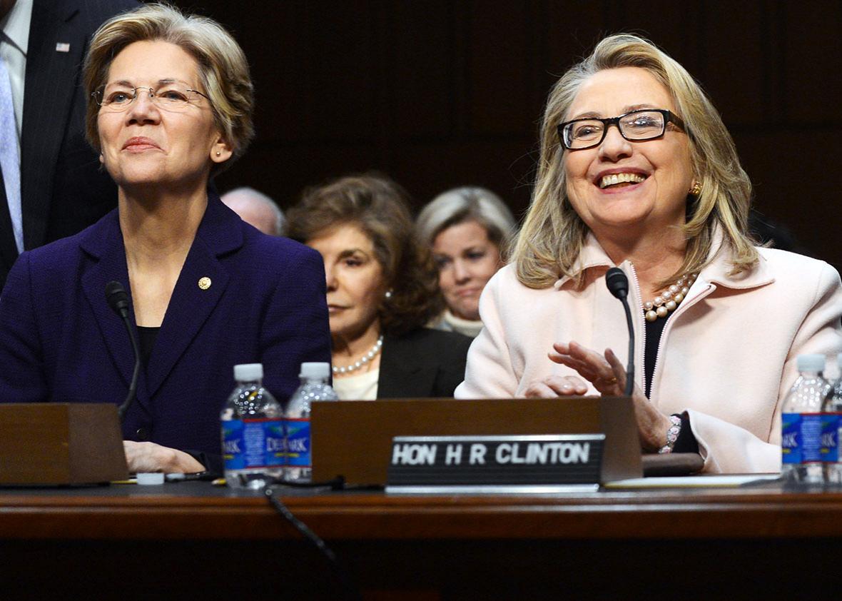 Sen.Elizabeth Warren,D-MA and Secretary of State Hillary Clinton are seated before John Kerry's confirmation hearings before the Senate Foreign Relations committee on Capitol Hill in Washington, DC, on January 24, 2013. 