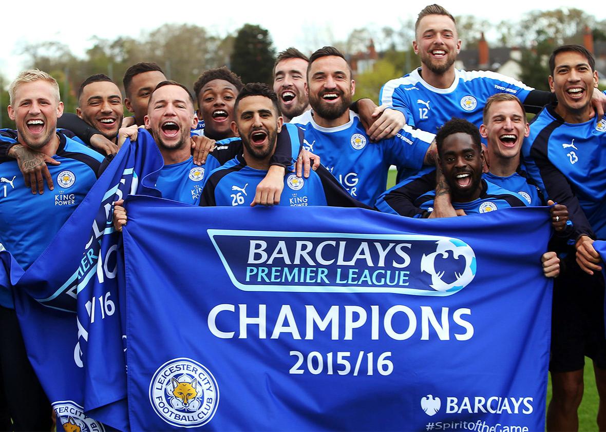 Leicester City players celebrate winning the Premier League title during a training session  at the Leicester City Training Ground on May 3, 2016 in Leicester, United Kingdom. 