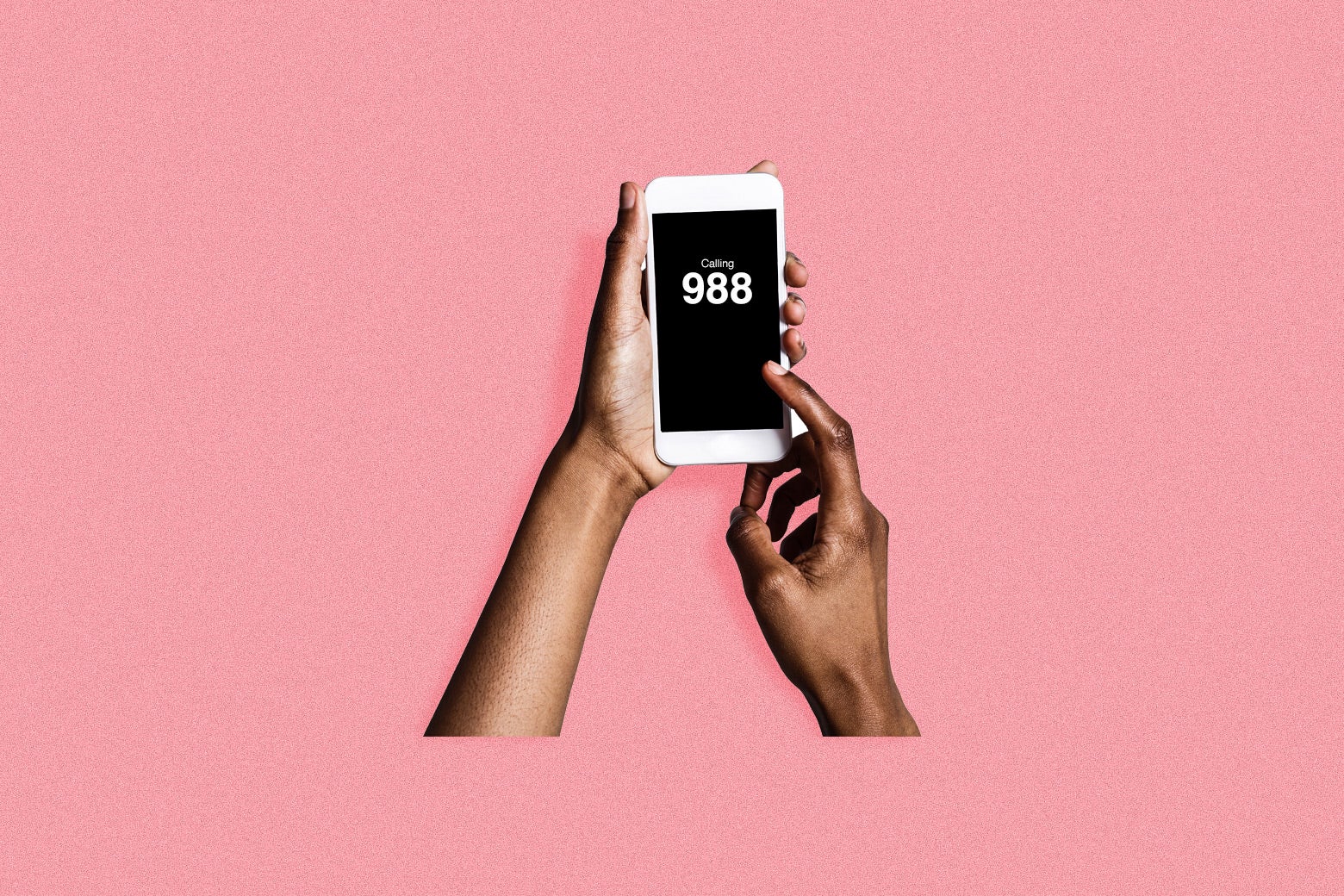 Hands hold a smartphone with the numbers 988 on it. 