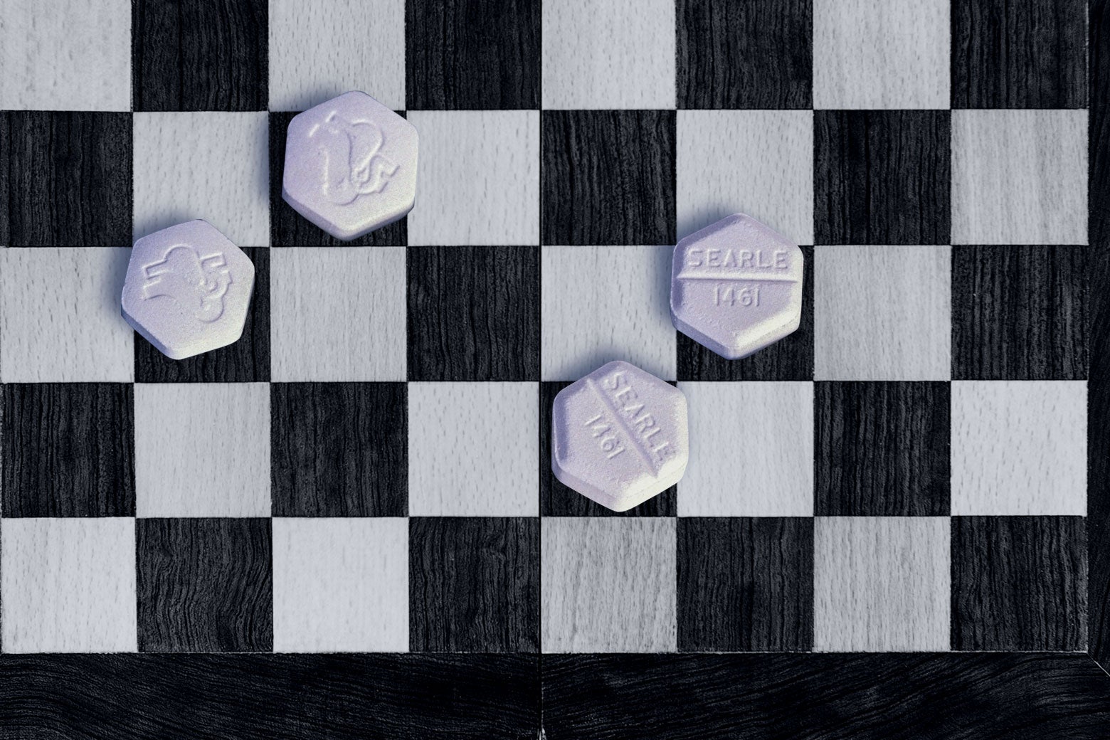 A chess board with pills instead of chess pieces.