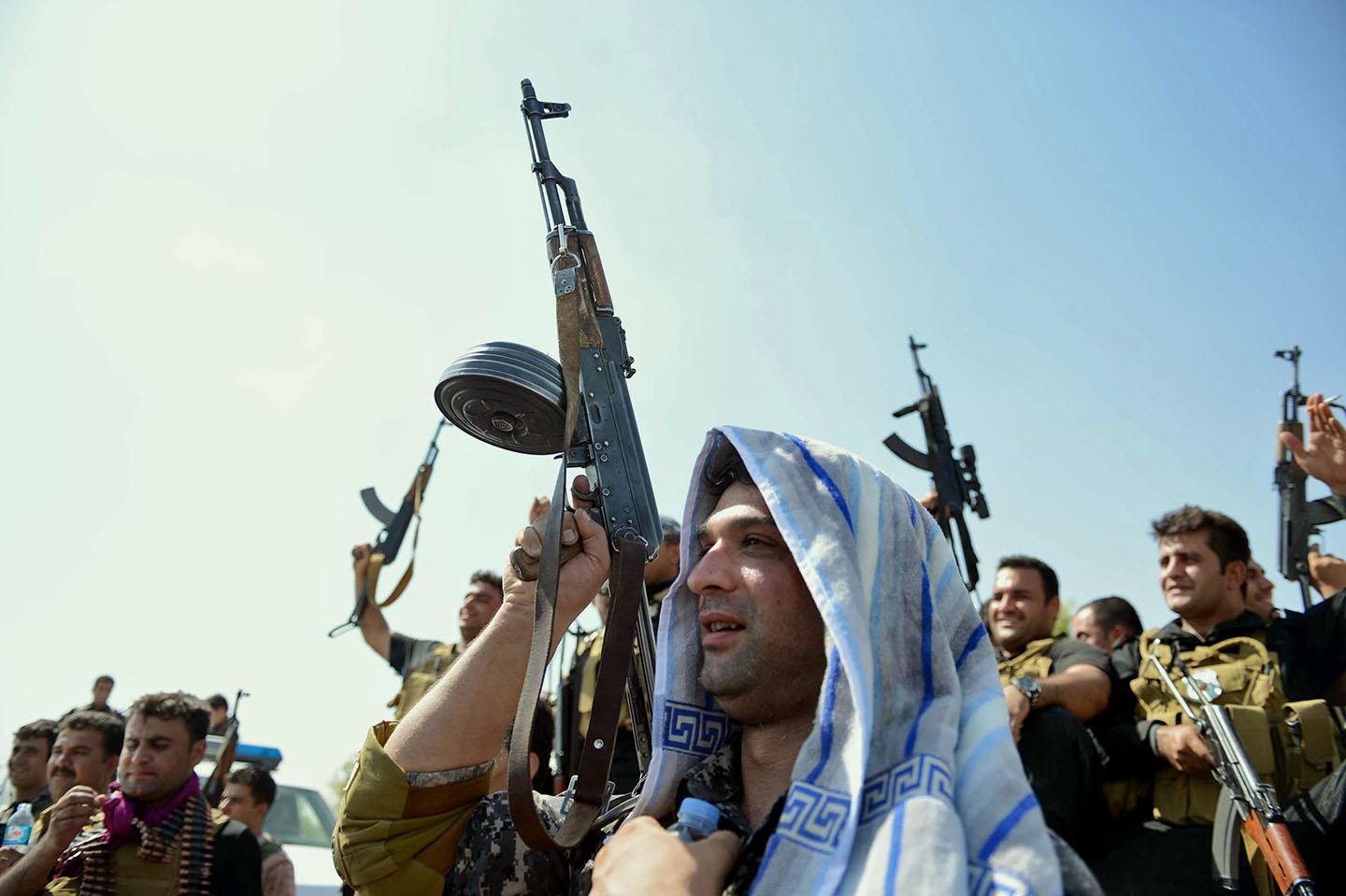 A militant Islamist fighter takes part in a military parade along the streets of Syria's northern Raqqa province.
