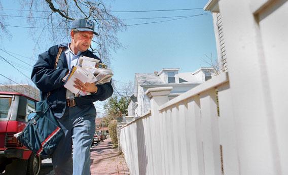 Mailman on his route in Cambridge, Mass.