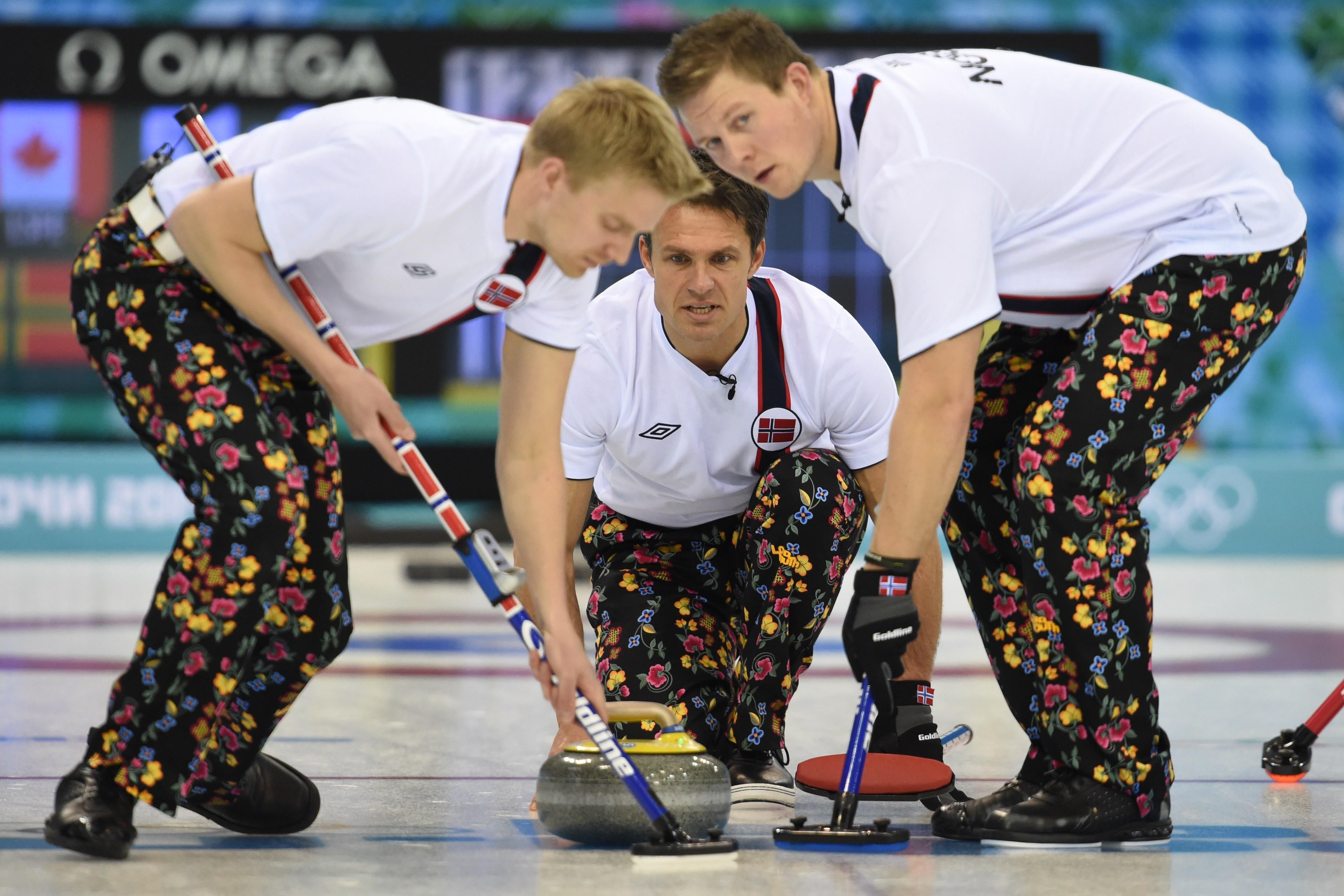 Norway's Thomas Ulsrud throws the stone during the Men's Curling Round Robin Session 7 at the Ice Cube Curling Center during the Sochi Winter Olympics on February 14, 2014.  AFP PHOTO / DAMIEN MEYER        (Photo credit should read DAMIEN MEYER/AFP/Getty Images)