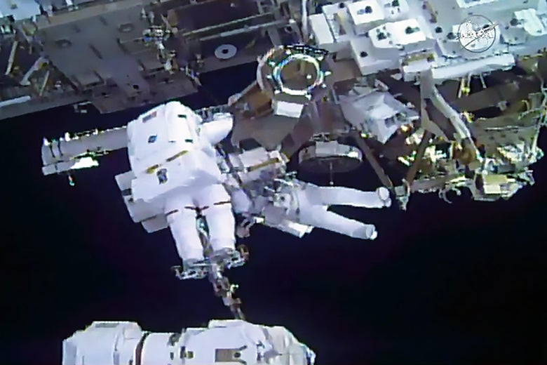 This still image from video courtesy of NASA shows spacewalkers Mark Vande Hei of the US (foreground) and Norishige Kanai of Japan transferring a spare robotic hand to a long-term stowage area on the International Space Station, February 16, 2018.
A Japanese and an American astronaut floated for hours outside the International Space Station on a spacewalk to repair the orbiting outpost's robotic arm and move some equipment into storage. The spacewalk, broadcast live on NASA TV, was the first for Japanese Aerospace Agency (JAXA) astronaut Norishige Kanai, and the fourth for his US counterpart Mark Vande Hei. / AFP PHOTO / AFP PHOTO AND NASA / NASA (Photo credit should read NASA/AFP/Getty Images)