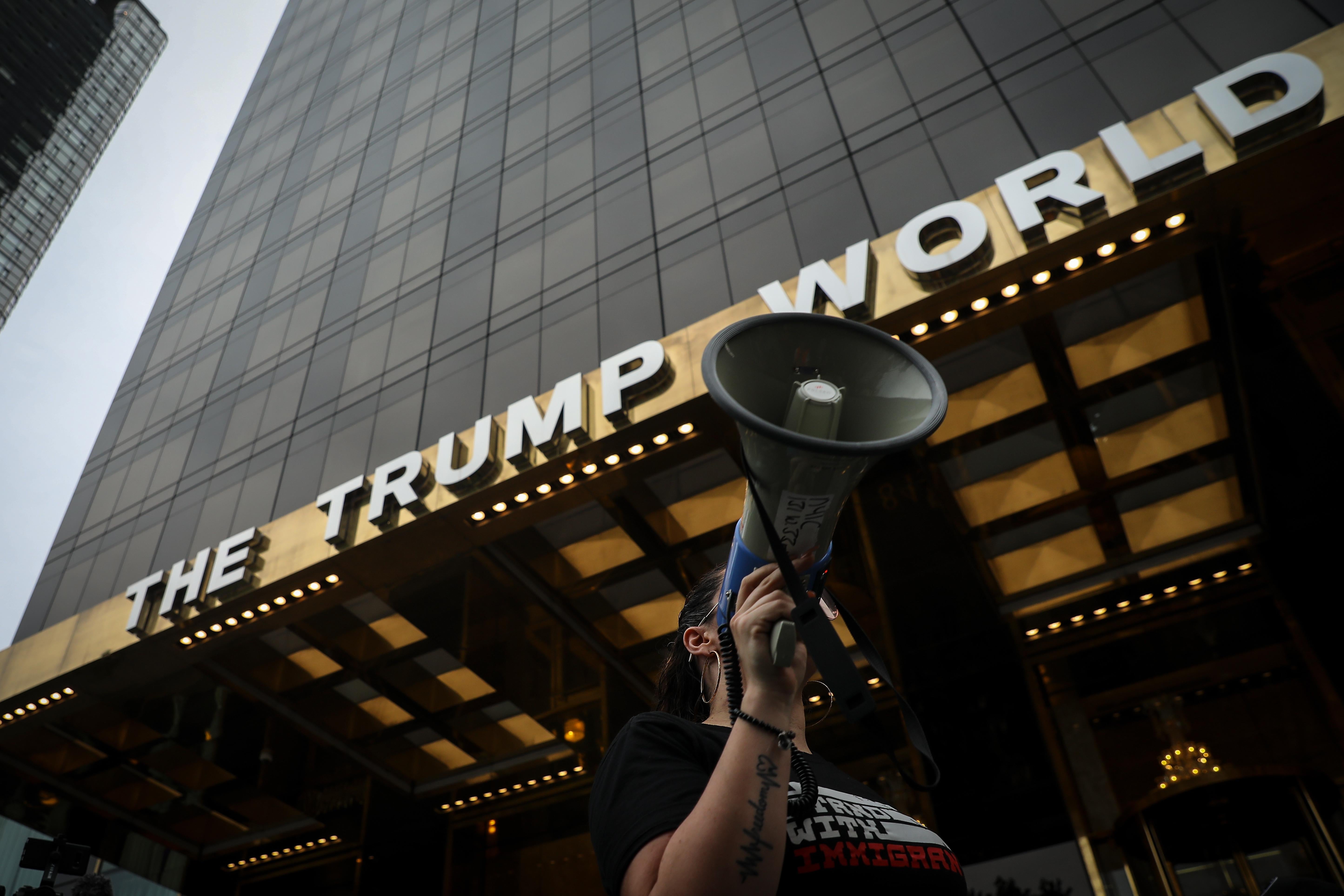 Activists rally outside of Trump World Tower to support immigrants and to mark World Refugee Day, June 20, 2018 in New York City. 