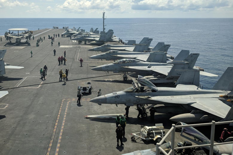 US Navy fighters jets aboard the USS Ronald Reagan aircraft carrier as it sails in South China Sea on its way to Singapore. 