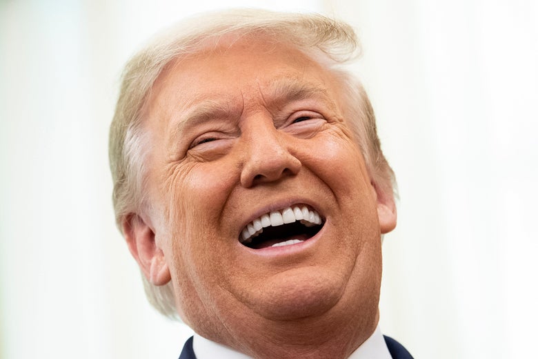 A close-up of Trump laughing. 