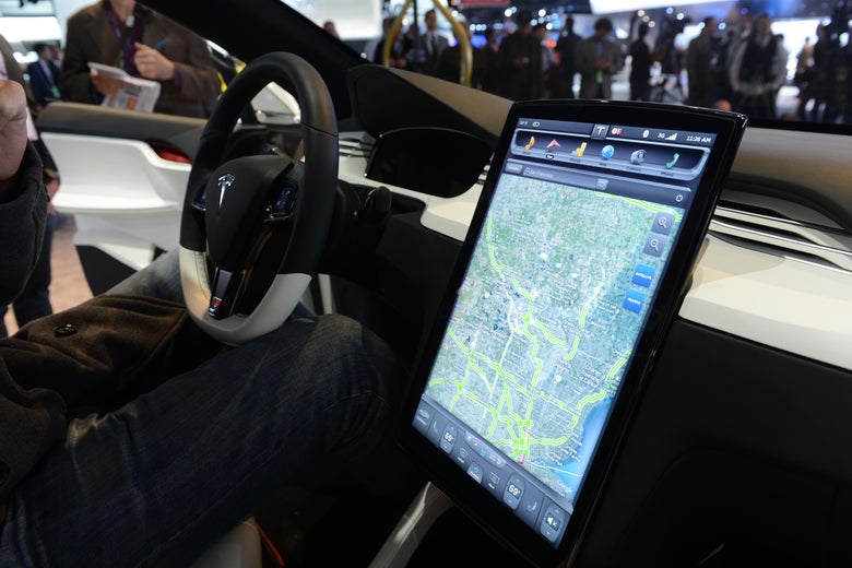 The Tesla Model X computer screen mounted on the dashboard is introduced at the 2013 North American International Auto Show in Detroit.