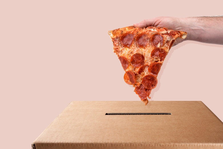 A hand holds a slice of pepperoni pizza above a cardboard ballot box.