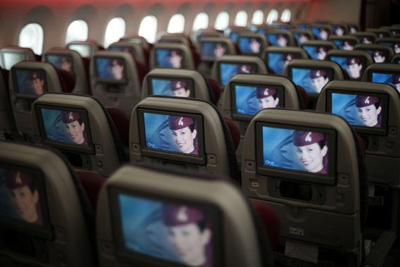 Seats and screens in the economy class cabin of Qatar Airways new Boeing 787 Dreamliner after it arrived on it's inaugural flight to Heathrow Airport, West London Dec. 13, 2012.