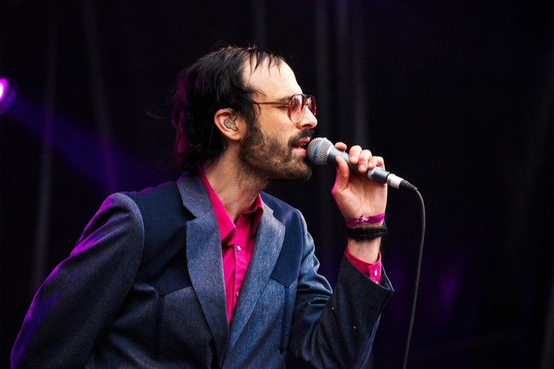 David Berman singing into a microphone.