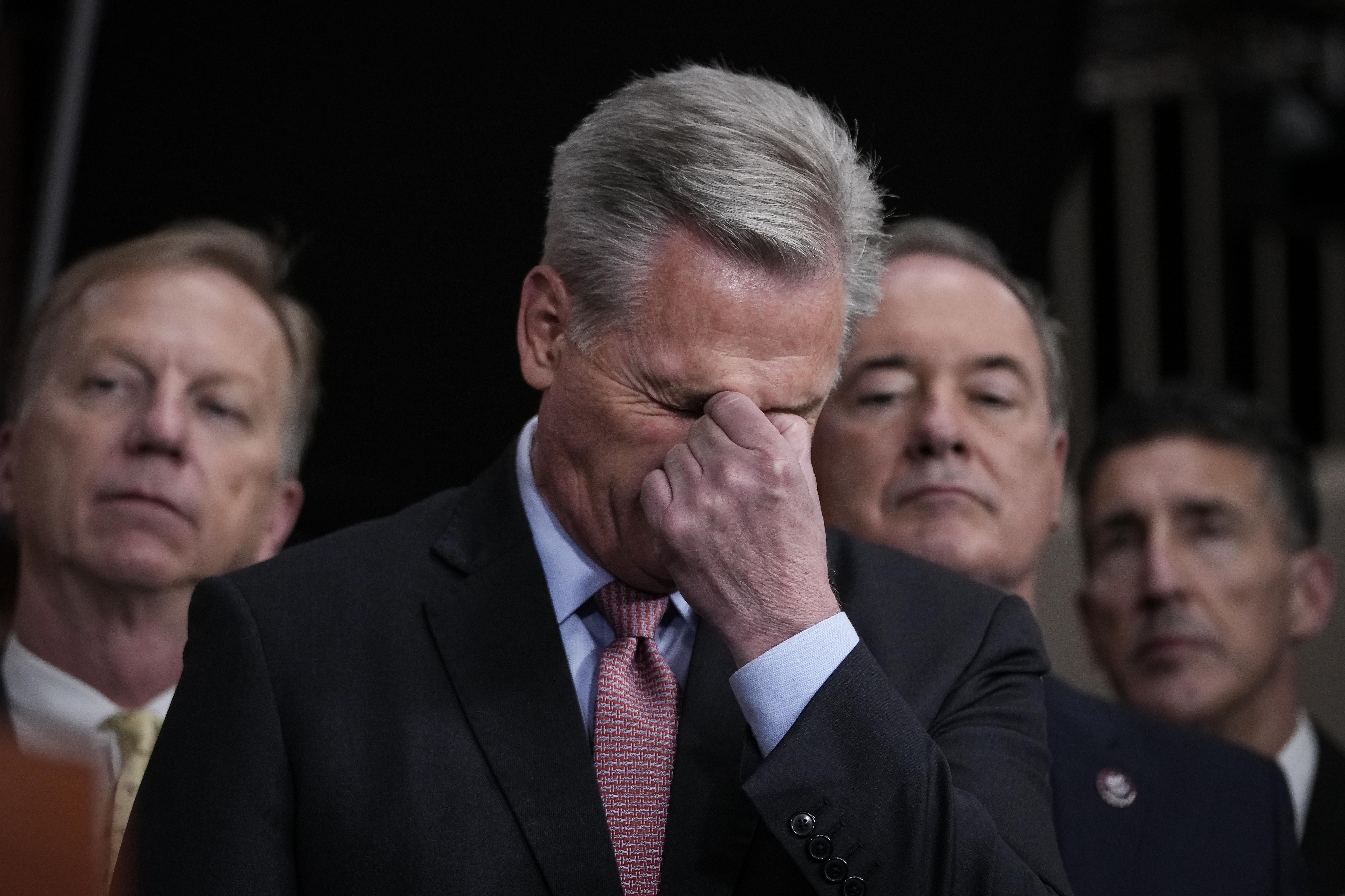 House Majority Leader Kevin McCarthy makes a face of frustration or tiredness.