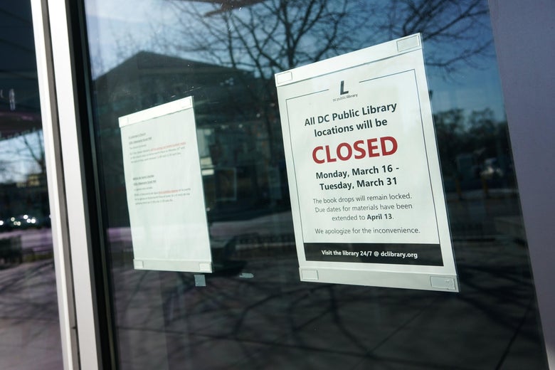 On a glass window, a sign says "All DC Public Library locations will be CLOSED Monday March 16–Tuesday March 31."