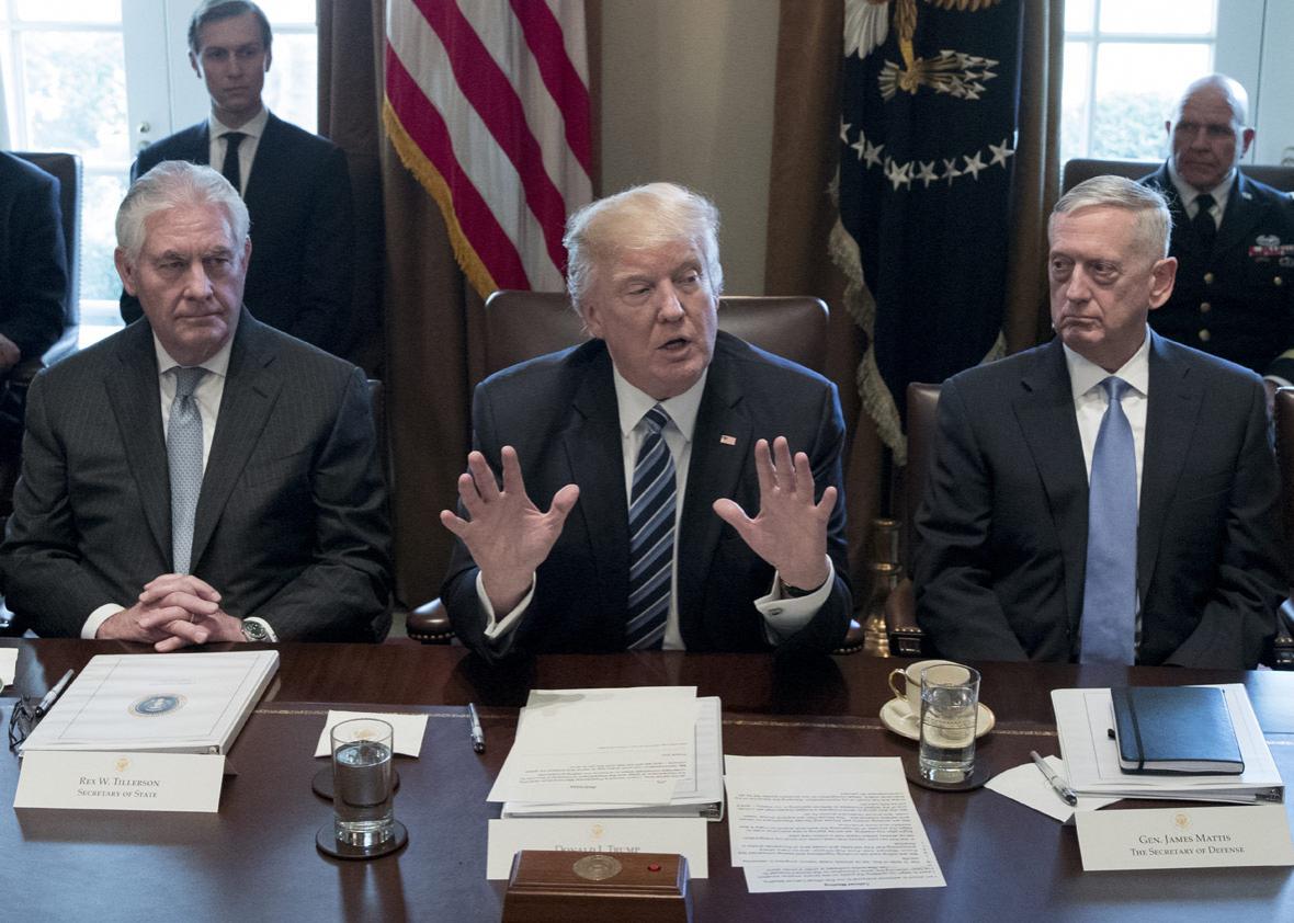 94926340President Donald Trump holds a meeting with members of his cabinet including Secretary of State Rex Tillerson (L) and Secretary of Defense James Mattis