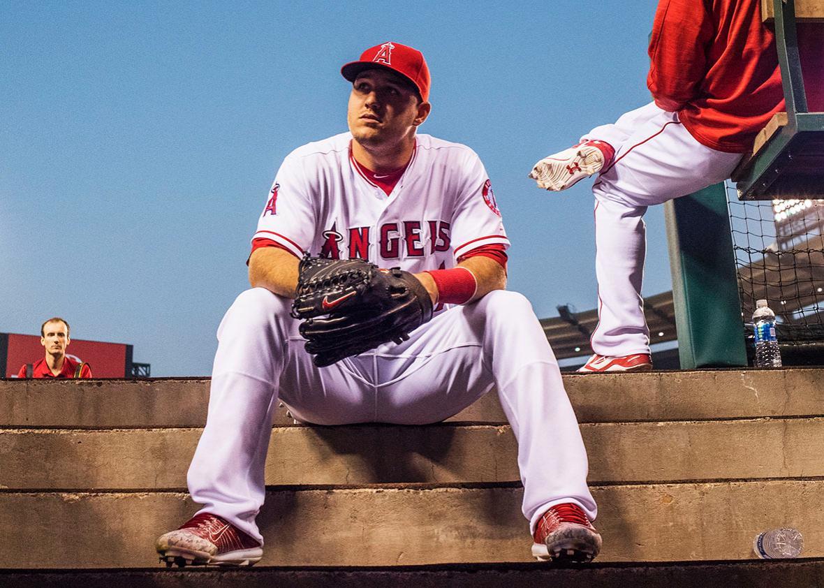 Mike Trout #27 of the Los Angeles Angels of Anaheim sits in the dugout before the game against the Toronto Blue Jays at Angel Stadium of Anaheim on September 15, 2016 in Anaheim, California. 