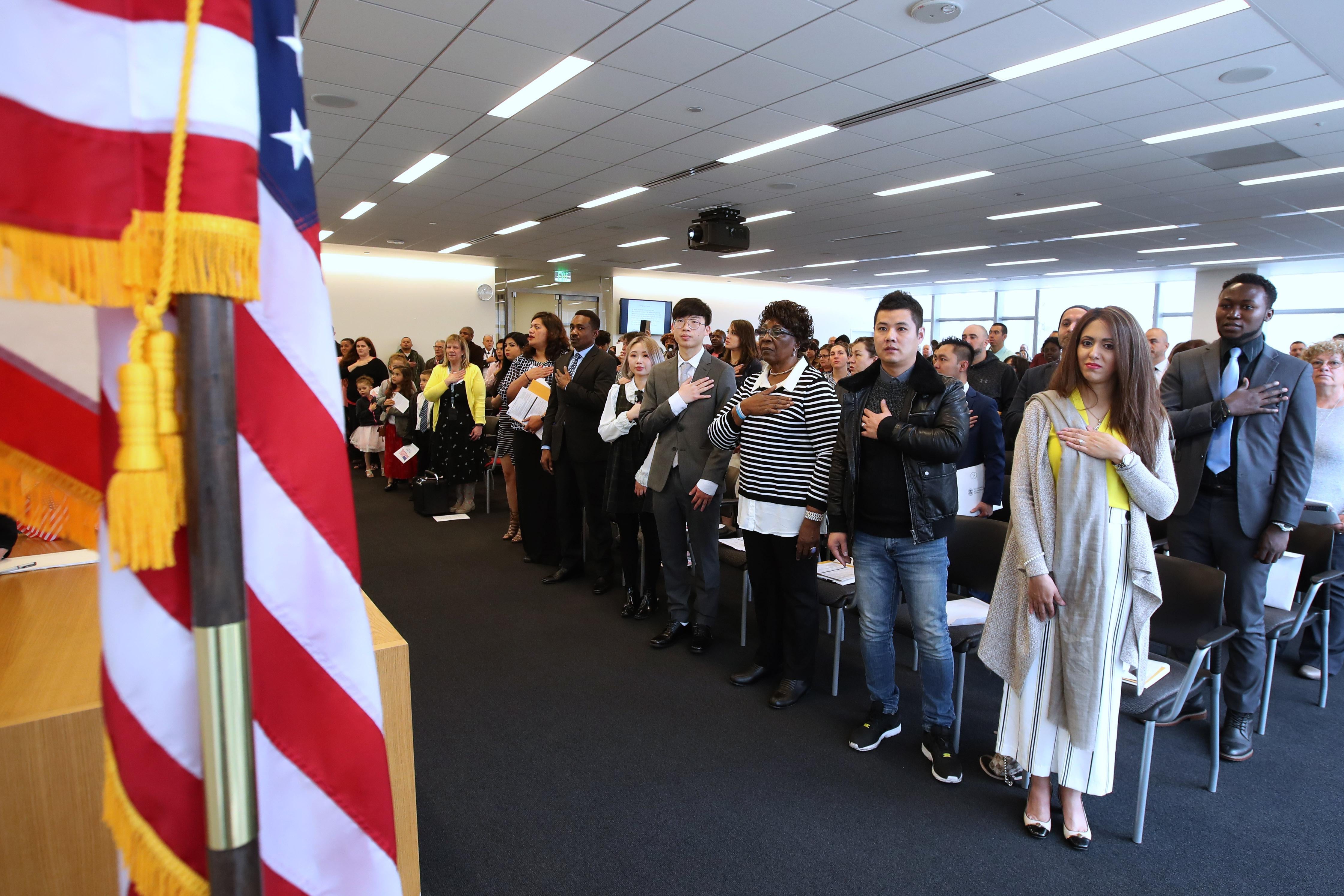 Soon-to-be U.S. citizens at a naturalization ceremony. American Samoans, though born in the United States, must apply for citizenship.