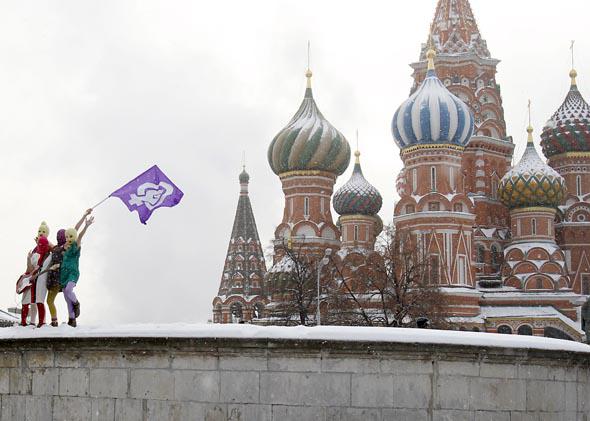 Members of the Russian radical feminist group 'Pussy Riot' sing a song.