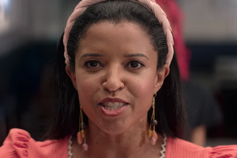 Renée Elise Goldsberry looks past the camera singing.